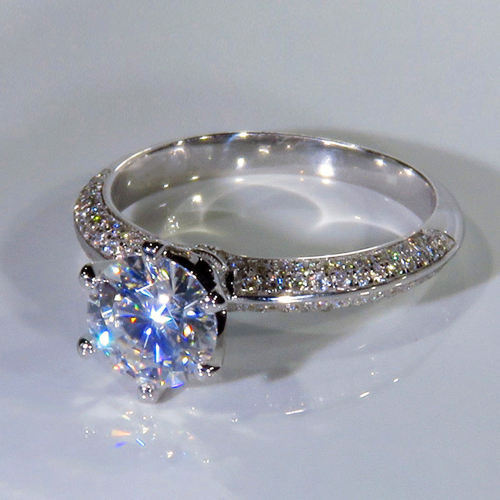 Grand Halo Solitaire Ring