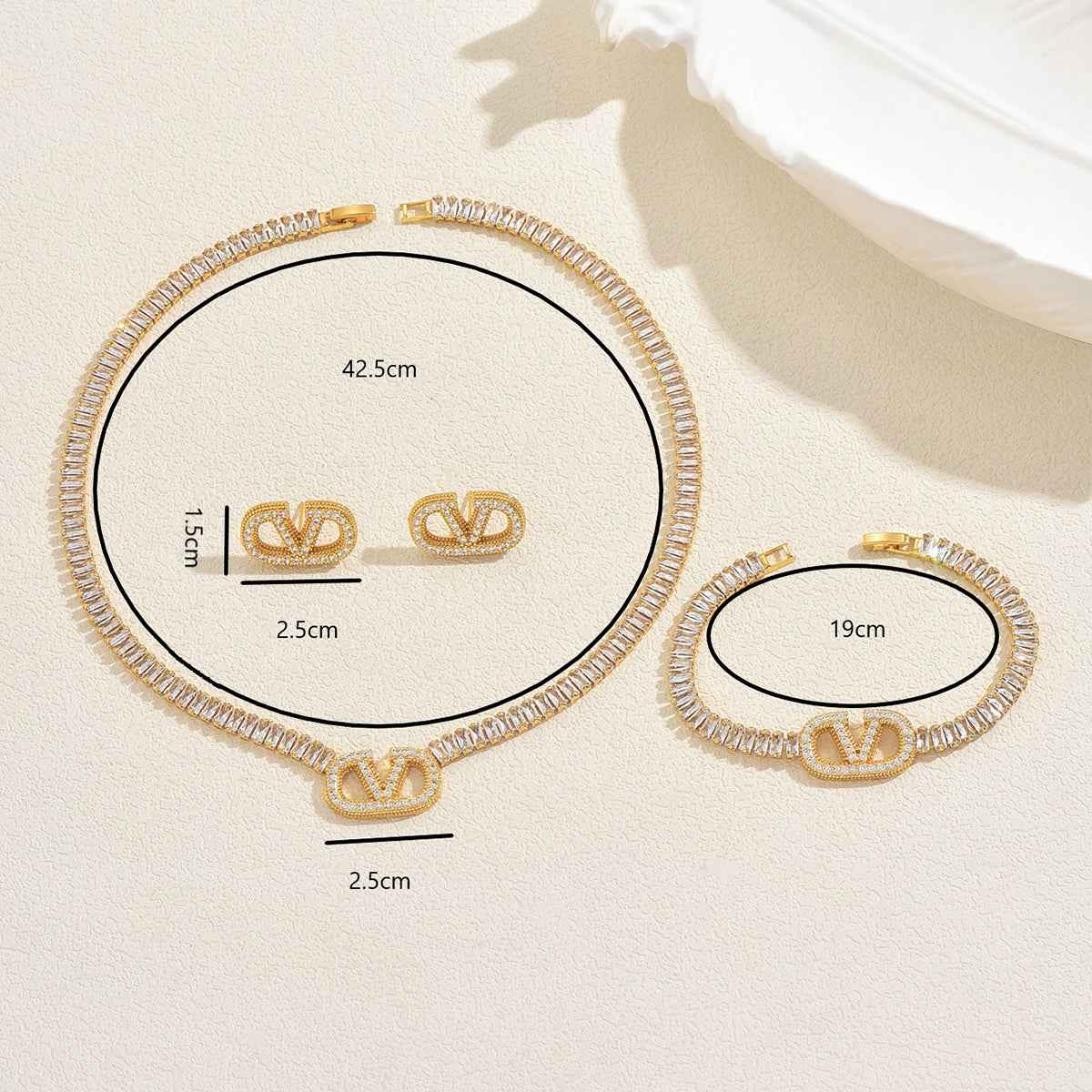 Celestia Signature | Luxe Zircon Necklace, Bracelet & Earring Set | Gold Plated Crystal Emblem Design | Complete Occasion Luxe Set