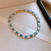 Aurelia Guard | Evil Eye Tennis Bracelet | Gold Plated Blue Enamel & Crystal Design | Protective Elegant Luxe Bracelet
