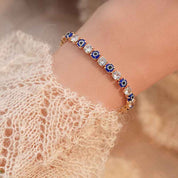 Aurelia Guard | Evil Eye Tennis Bracelet | Gold Plated Blue Enamel & Crystal Design | Protective Elegant Luxe Bracelet