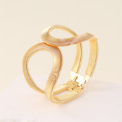 Serpent Twist Luxe Bangle