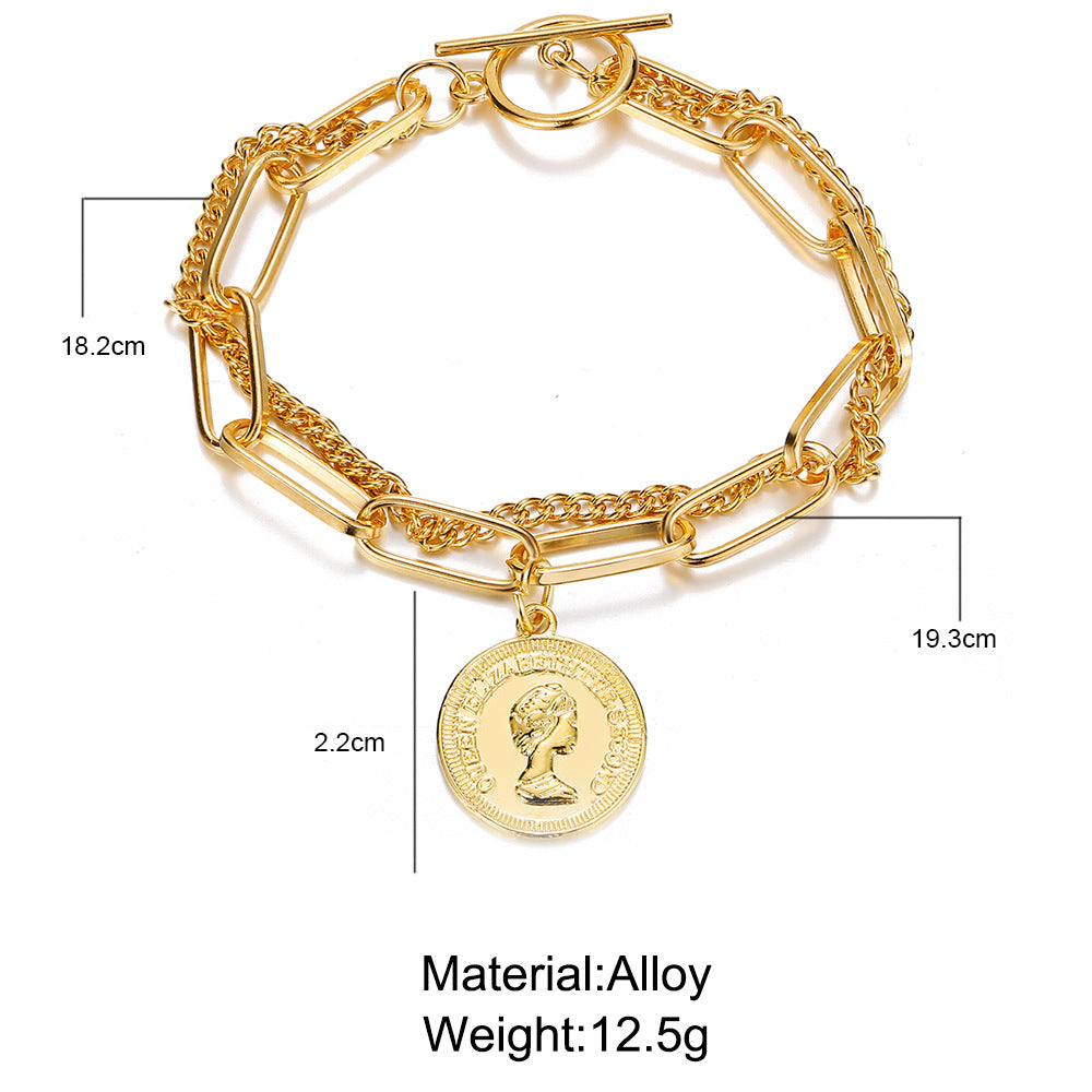 Regal Coin-Link Charm Bracelet