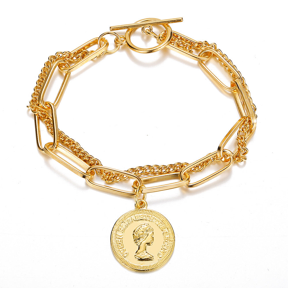 Regal Coin-Link Charm Bracelet